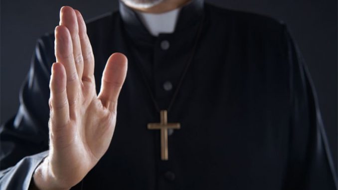 priest blessing cna Lunamarina Shutterstock
