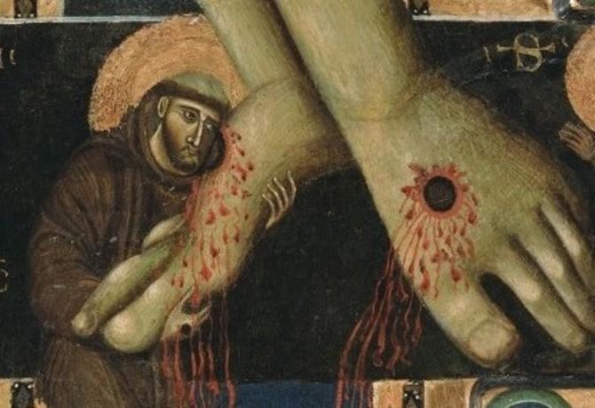 San Francesco abbraccia i piedi di Cristo 